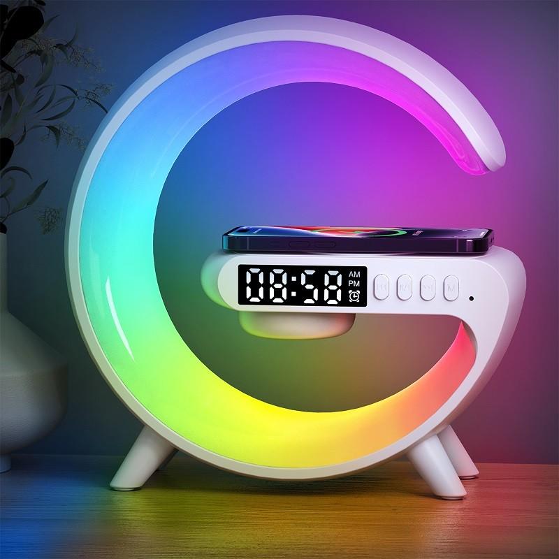 Colorful crescent-shaped night light with digital clock and wireless charging on a wooden surface.
